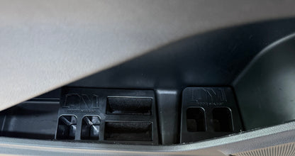 Car interior with a close-up of a Door Mags unit