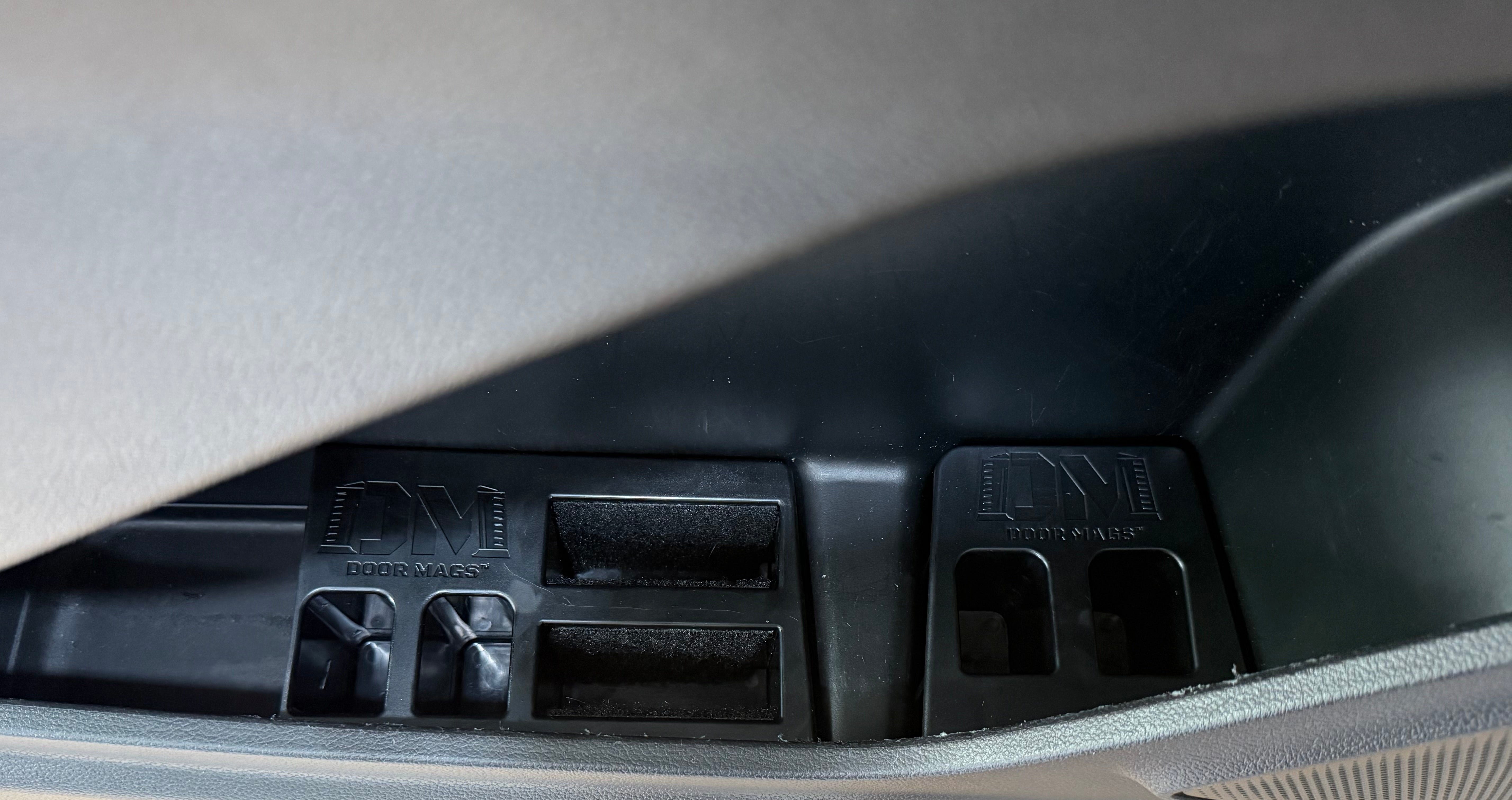 Car interior with a close-up of a Door Mags unit